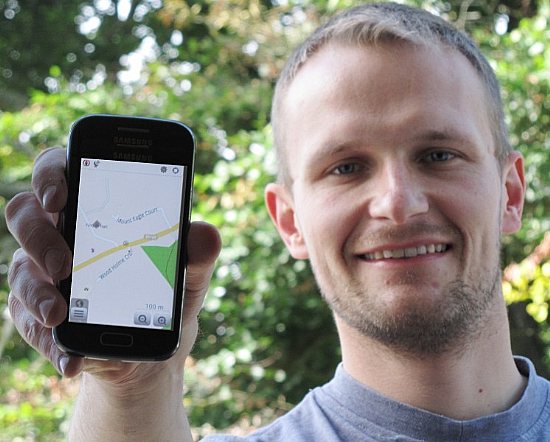 Million Miles Project Officer Peter Elbourne with OpenStreetMap on smartphone